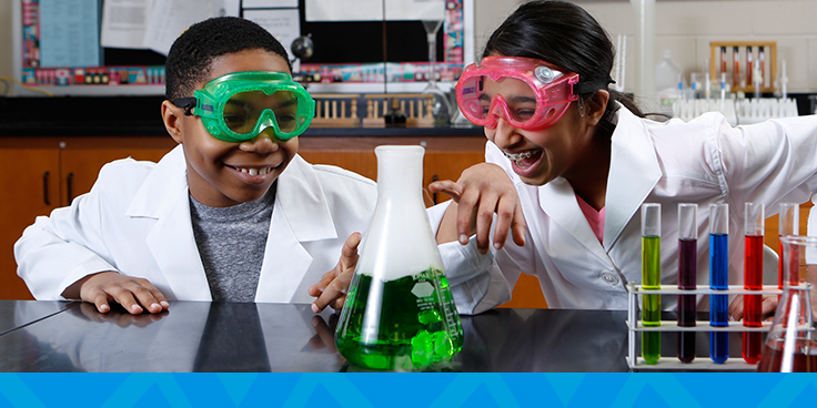 boy and girl conducting a science experiment